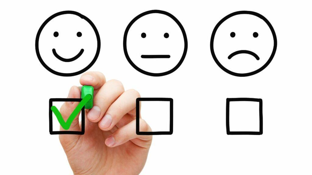 En grön bock i en glad smiley